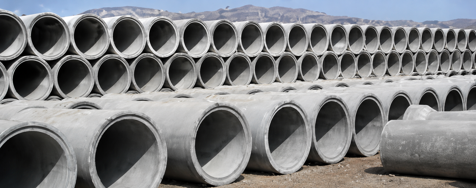 Dawood RCC concrete pipes stacked at factory yard Lahore